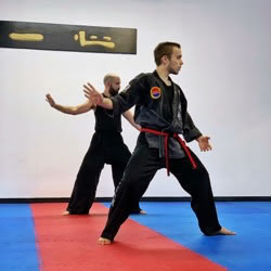Two Tukong Austin students practicing partner drills